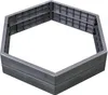 A hexagonal raised garden bed frame made of gray plastic. Voir les images du produit