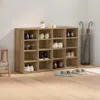 A shoe cabinet with multiple shelves filled with shoes, placed against a white wall. Náhľad obrázku produktu