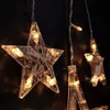 Close-up of transparent star-shaped decorative lights with warm white LEDs. Anteprima dell’immagine prodotto