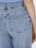 Close-up of the back pocket of light blue denim jeans. Produktbild-Vorschau