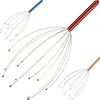 Three head massagers with different colored handles are arranged on a white background. Náhľad obrázku produktu
