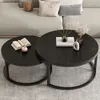 Two round coffee tables are placed on a carpet in front of a sofa. Náhľad obrázku produktu