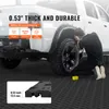 A person is working on a white truck parked on a black textured floor, with marketing text overlays. Podgląd zdjęcia produktu