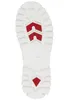 The sole of a white boot with red accents. Podgląd zdjęcia produktu