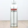 A silver bottle of Danzka Vodka sits on a wooden surface against a white background. Produktbild-Vorschau