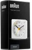 The image shows the packaging of a Braun travel alarm clock. Anteprima dell’immagine prodotto