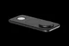 A black wireless charging pad with silver accents is shown on a black background. Náhľad obrázku produktu