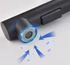 A close-up of a black kitchen faucet head with blue light effects and arrows indicating air flow. Produktbild-Vorschau