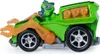A green toy vehicle with orange accents and a small figure in the driver's seat, shown from the side against a white background. Produktbild-Vorschau