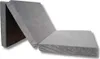 A gray folding mattress is shown on a white background. Voir les images du produit