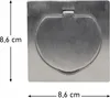 A square, brushed metal electrical outlet cover with a circular, hinged flap in the center. Dimensions are indicated with measurement lines and text. Náhled obrázku produktu