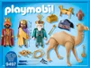 A product image displaying a Playmobil set with three figures, a camel, and accessories. Náhled obrázku produktu