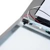 A close-up view of electronic components, including a switch and LEDs, attached to a metallic surface. Podgląd zdjęcia produktu