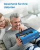 A couple is looking at a massage gun gift box. Produktbild-Vorschau