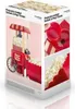 The image shows the packaging of a red and white popcorn maker designed like a retro cart. Náhľad obrázku produktu