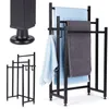 A collage of images showing a black metal towel rack with towels, and a close-up of its base. Náhľad obrázku produktu