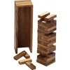A wooden Jenga-like game with a tower built and some blocks scattered around, next to its wooden storage box. Podgląd zdjęcia produktu