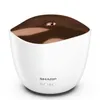 A white ultrasonic aroma diffuser with a copper-colored lid, shown from a slightly elevated front-side angle on a white background. Produktbild-Vorschau