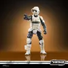A Star Wars Scout Trooper action figure is displayed against a gradient brown background. Náhled obrázku produktu