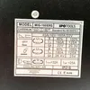 A close-up of a label on a black surface, showing product specifications and model information. Produktbild-Vorschau