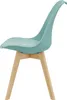 A single mint green chair with wooden legs, shown from the side against a white background. Náhled obrázku produktu