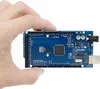 A hand holding a blue circuit board. Anteprima dell’immagine prodotto