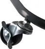 A close-up view of a caster wheel attached to a dark metal frame. Voir les images du produit