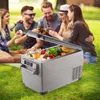 People having a picnic in a park with a portable refrigerator. Voir les images du produit