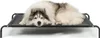 A dog lying on an elevated pet bed. Anteprima dell’immagine prodotto