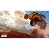 An orange off-road vehicle is airborne over a desert landscape with mountains and a city in the distance. Produktbild-Vorschau