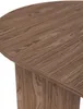 Close-up view of a round wooden table with a Nussbaum Wisconsin wood grain pattern. Produktbild-Vorschau