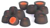 A collection of black silicone earbud tips with orange inner cores, arranged on a white background. Náhled obrázku produktu