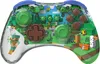 A Minecraft-themed Nintendo Switch controller with a transparent casing revealing a forest biome scene inside. Náhľad obrázku produktu