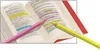 An open book with highlighted text and two colored pencils. Anteprima dell’immagine prodotto