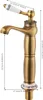 A vintage-style brass faucet with a ceramic handle, shown with measurement annotations. Náhled obrázku produktu