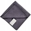 A folded gray microfiber cloth with a small white tag attached. Produktbild-Vorschau