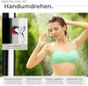 A woman showering outdoors with a solar shower. Náhled obrázku produktu