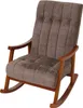 A brown upholstered rocking chair with wooden armrests and base, isolated on a white background. Podgląd zdjęcia produktu
