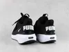 Rear view of a pair of black Puma sneakers with white soles. Podgląd zdjęcia produktu