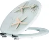 A toilet seat decorated with starfish and shells. Produktbild-Vorschau
