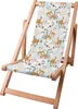 A wooden beach chair with a fabric seat featuring a pattern of cartoon tigers and floral elements.