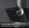 A close-up of a black range hood with steam coming out, highlighting its fan and control panel. Text describes its features. Produktbild-Vorschau