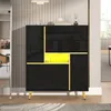 A modern black shoe cabinet with gold accents and a bright yellow interior compartment, displayed in a well-lit room with a striped wall and a rug. Podgląd zdjęcia produktu