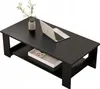 A black coffee table with a shelf, a laptop, and a vase with plants on it. Produktbild-Vorschau