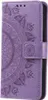 A purple flip phone case with a mandala pattern. Produktbild-Vorschau