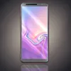 A smartphone with a colorful abstract wallpaper displayed on its screen, set against a dark, textured background with a reflection below. Produktbild-Vorschau