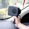 A hand holding a black car heater in a car interior, with the windshield and trees visible in the background. Náhľad obrázku produktu