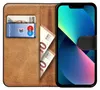 A book-style phone case with a phone, cards, and cash inside. Podgląd zdjęcia produktu
