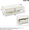 A diagram showing the dimensions of a white and gold TV lowboard and couch table. Produktbild-Vorschau