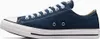 A side view of a single navy blue Converse Chuck Taylor All Star low-top sneaker. Produktbild-Vorschau